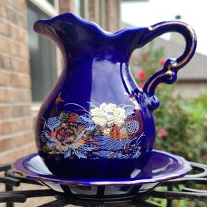 Elegant Blue Porcelain Pitcher and Saucer Set